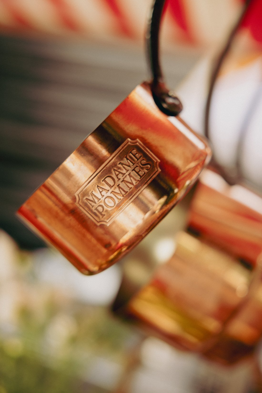 The engraved plate on a copper pan