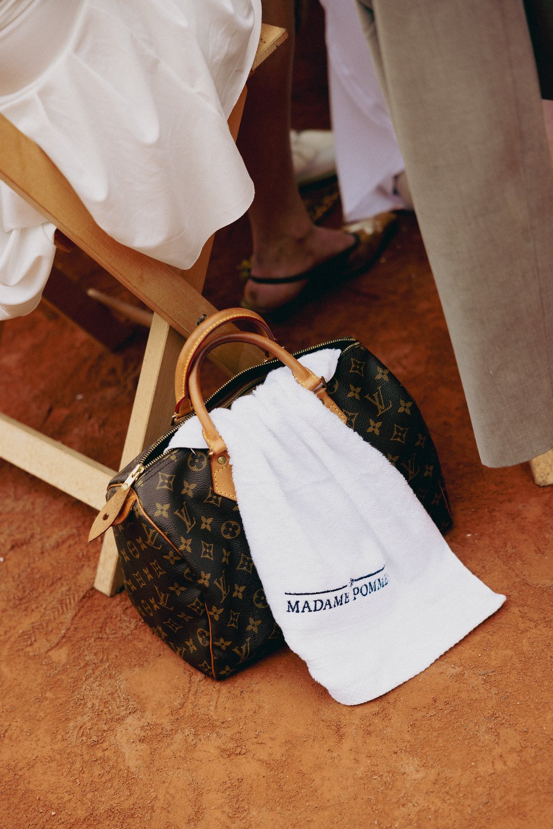 The house bag beside a terrace chair